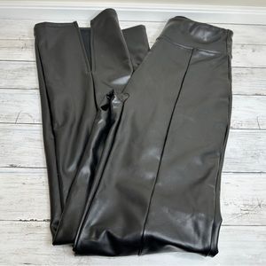Soft black faux leather pants, slits at hem
